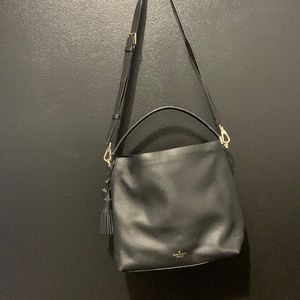 Black Kate Spade bag.